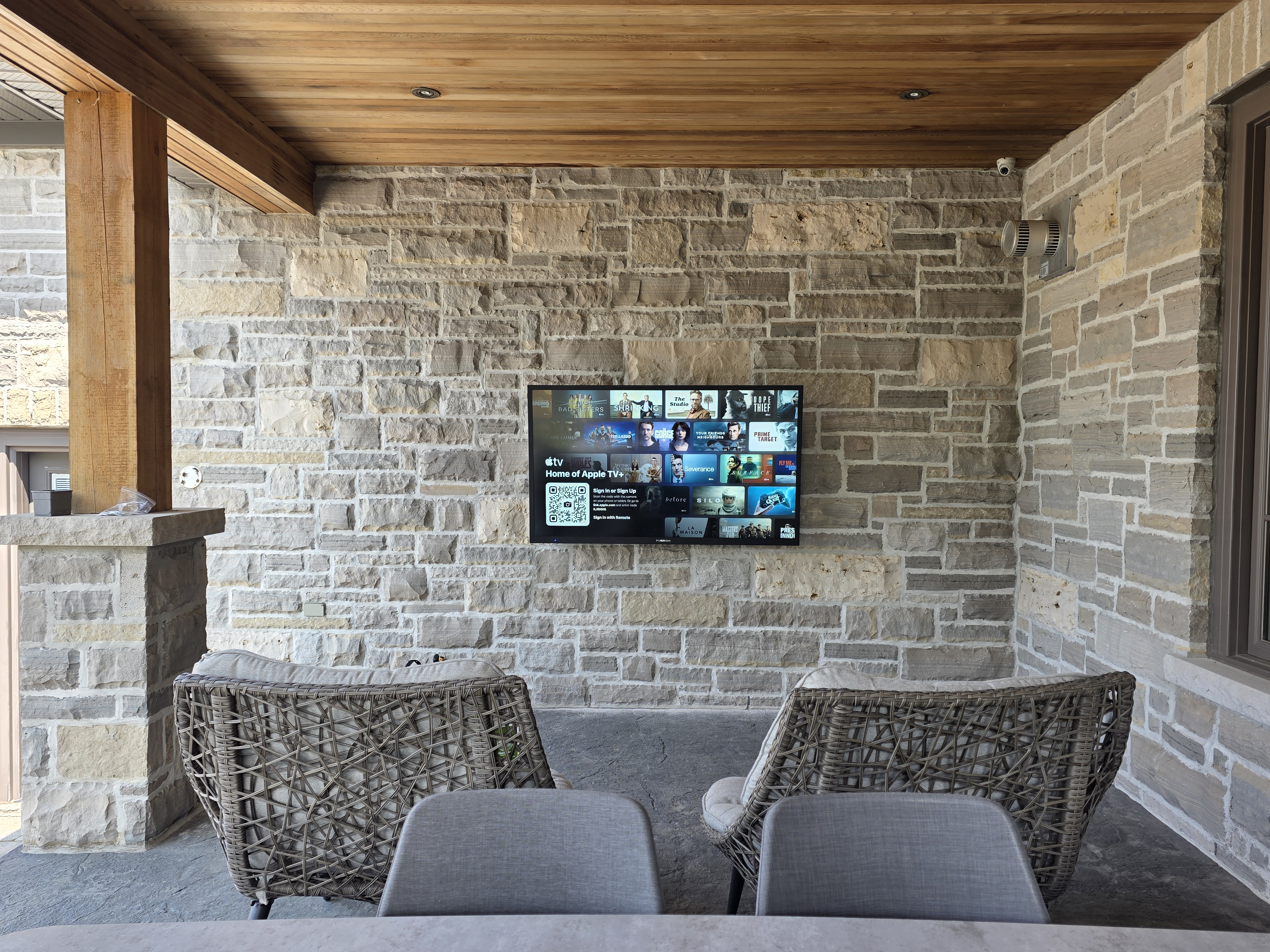 Weatherproof outdoor TV installation for patio entertainment system