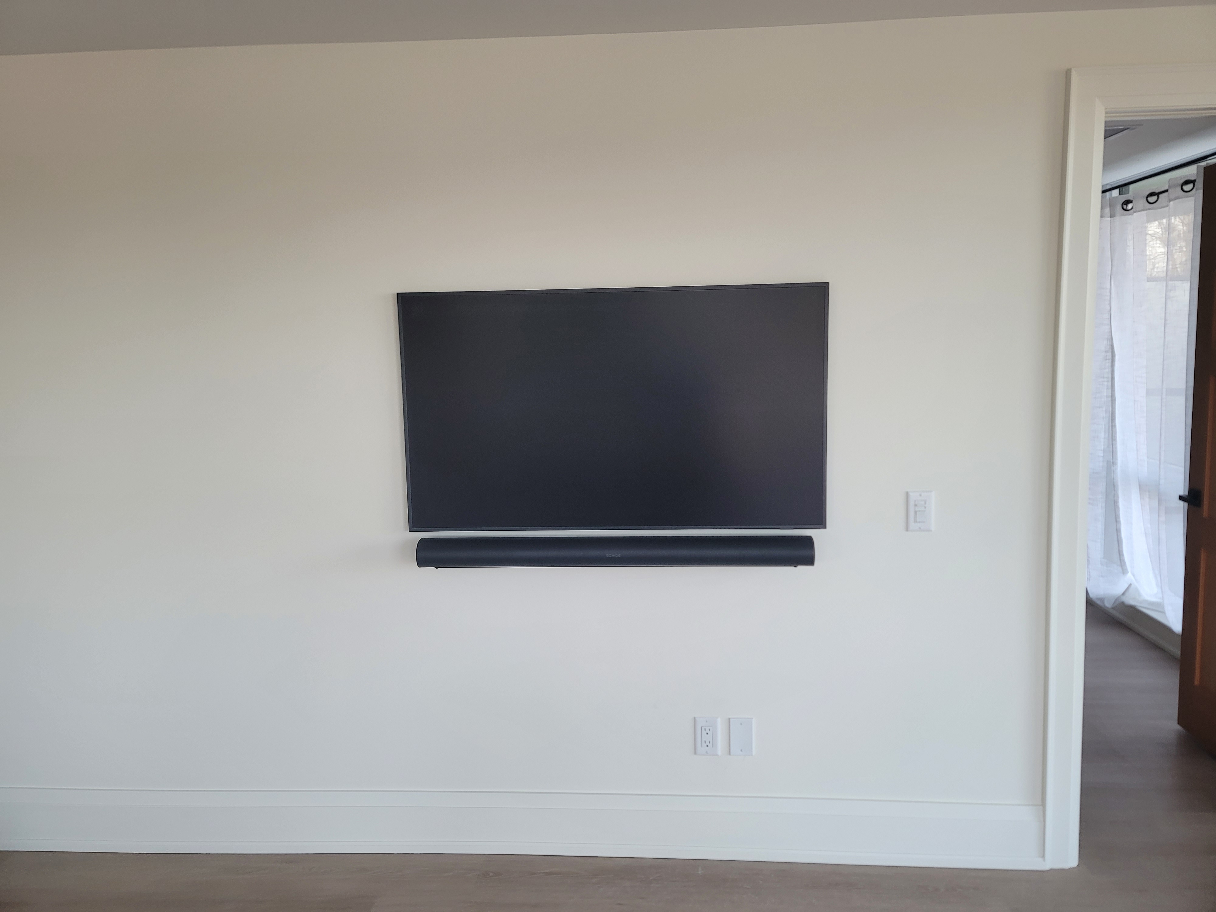 Elegant Blue Mountains condo living space with integrated RA3 lighting