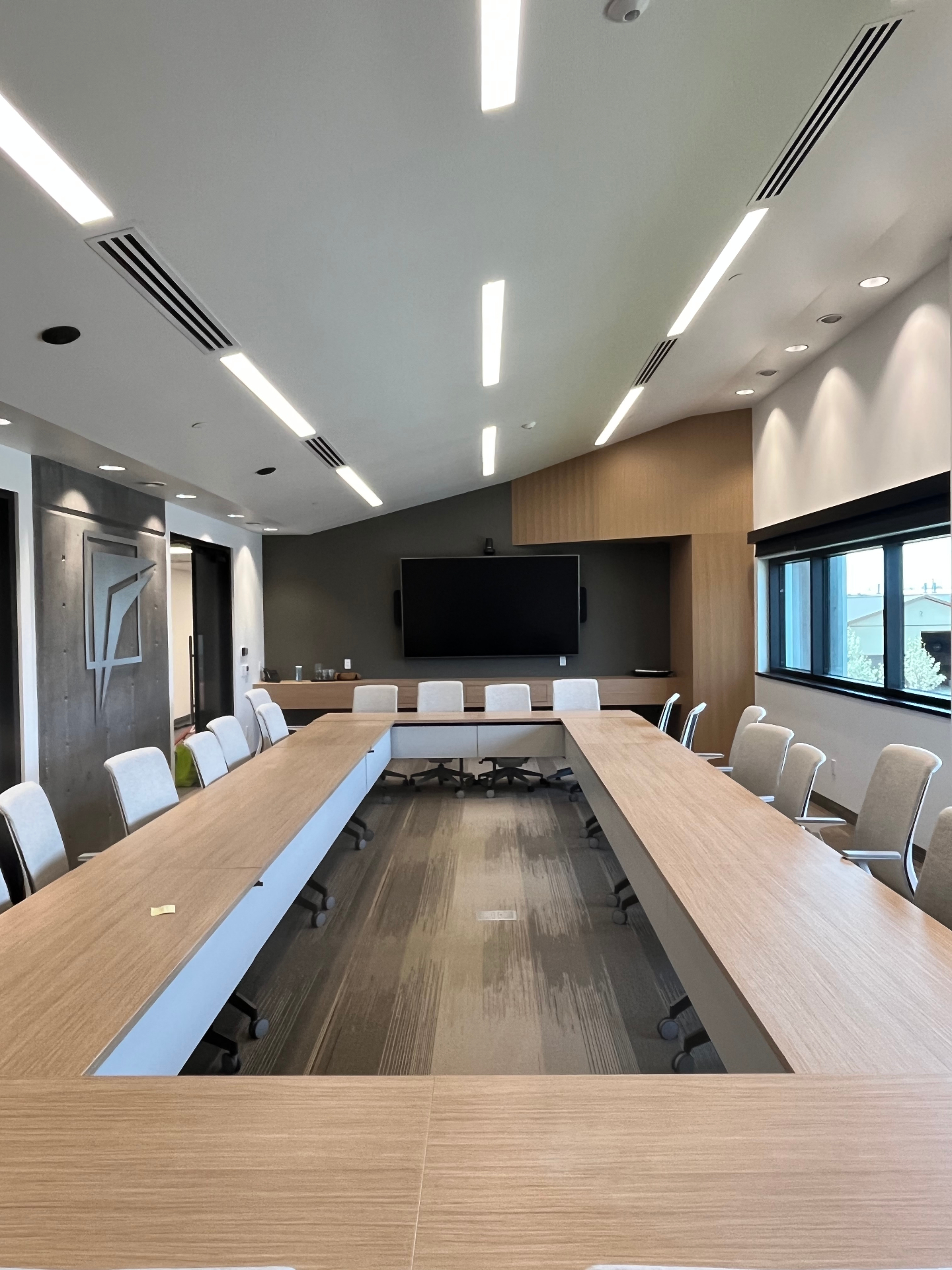 Modern Collingwood boardroom with a 98-inch display