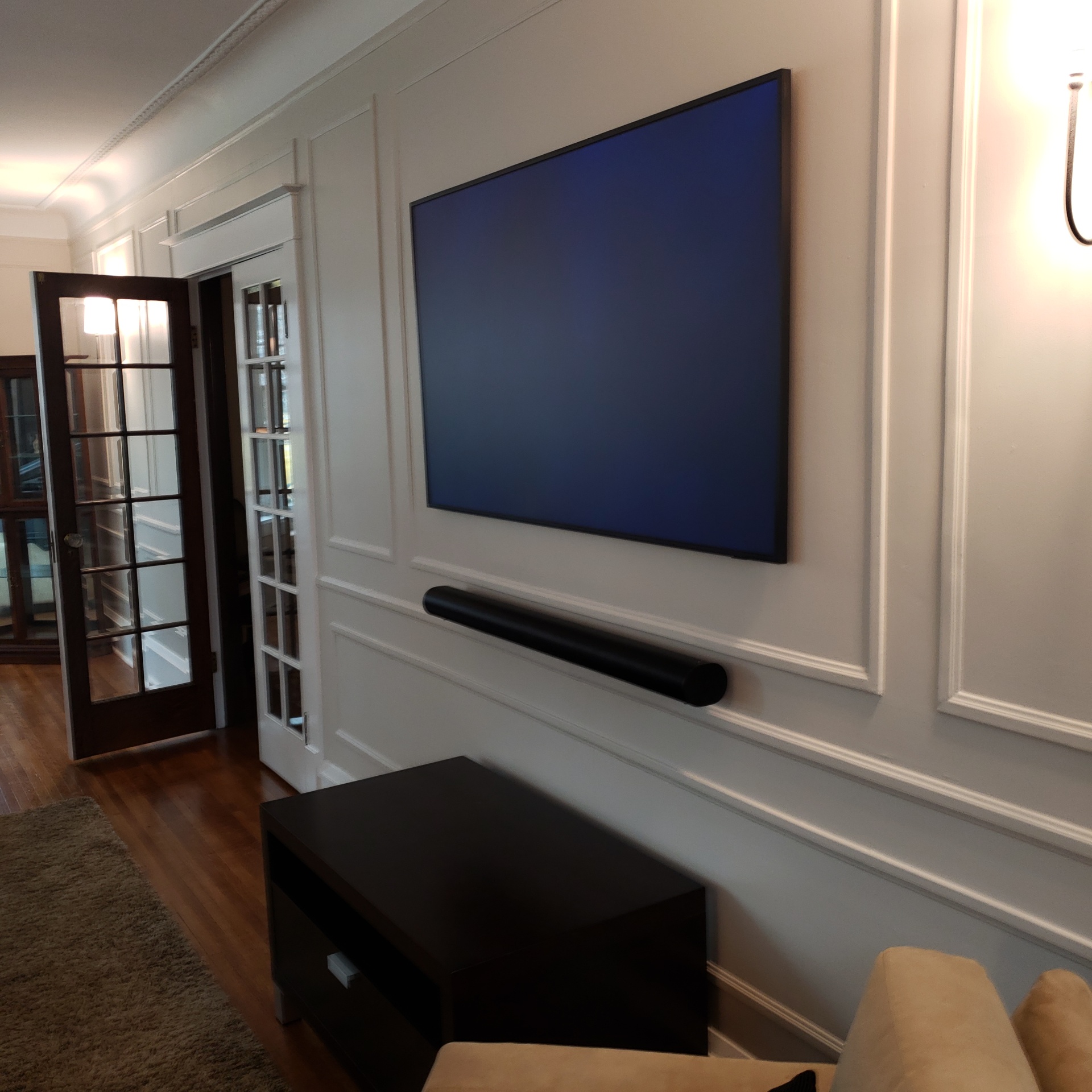 Samsung Frame TV installation with Sonos Arc soundbar and custom millwork