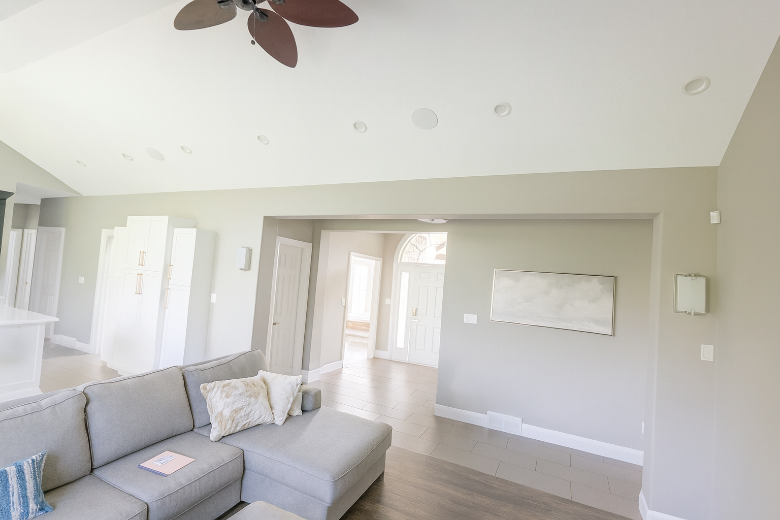 Thornbury living room with multiple in-ceiling speakers retrofitted post-build