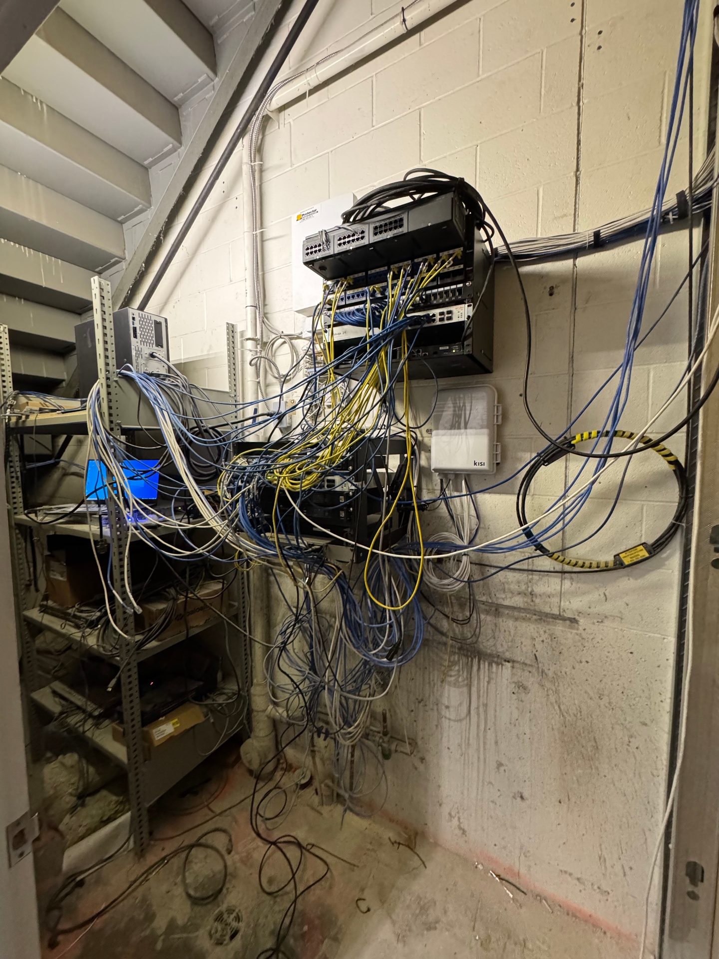 Poorly organized smart home system with tangled cables and messy installation