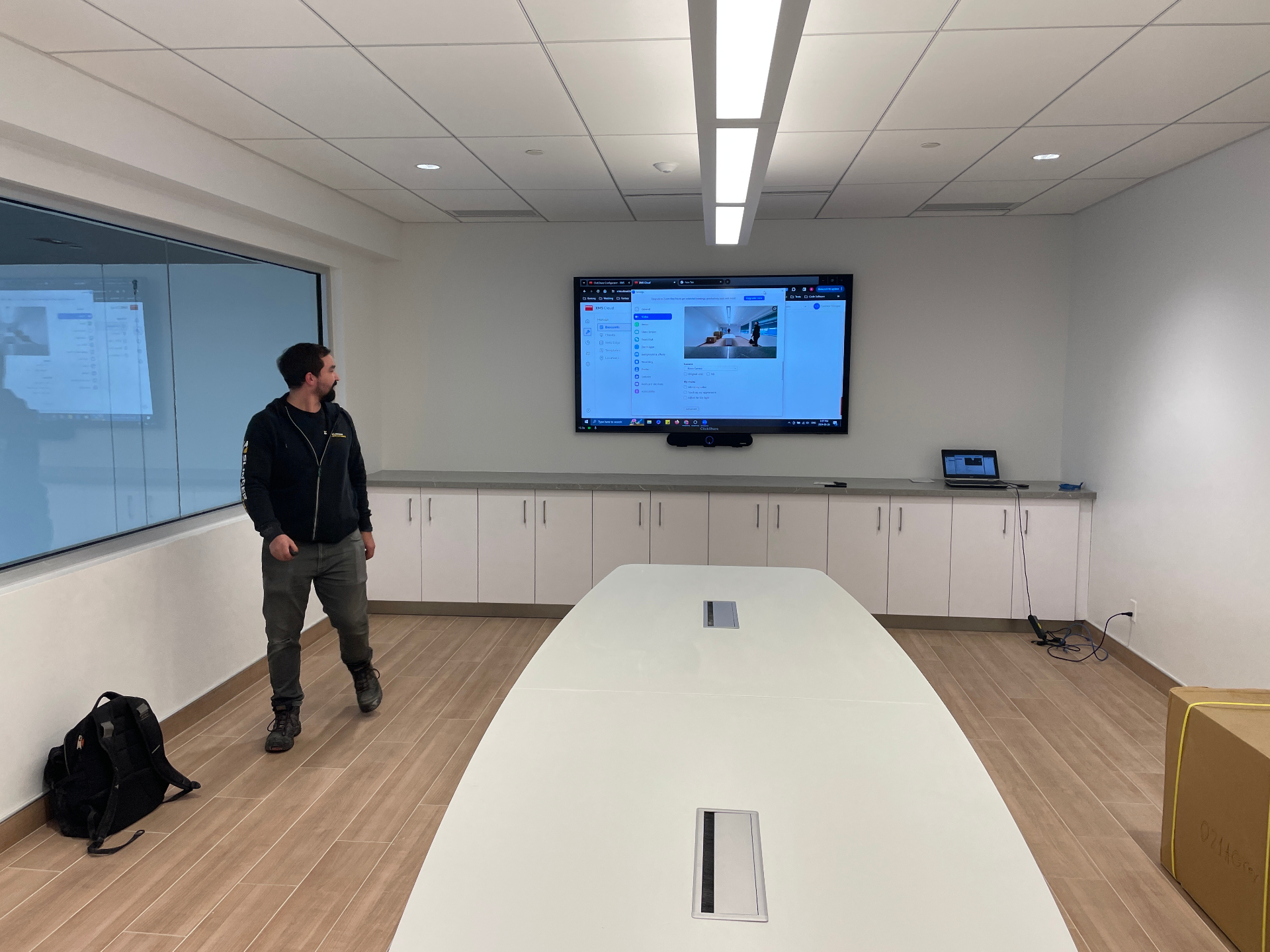 Dealership boardroom with conferencing display and ClickShare in Collingwood
