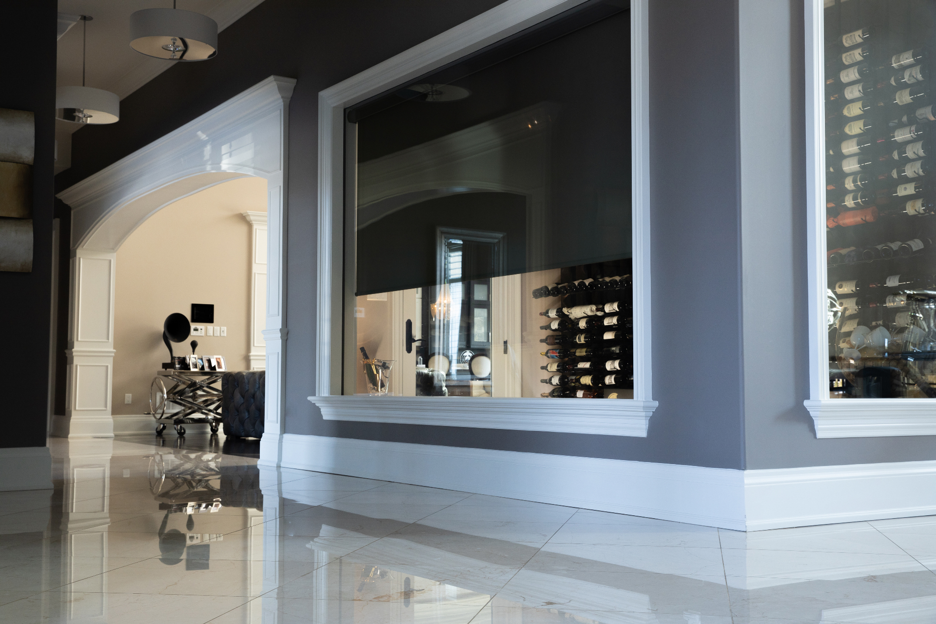 Elegant wine room with climate-controlled storage and sophisticated lighting