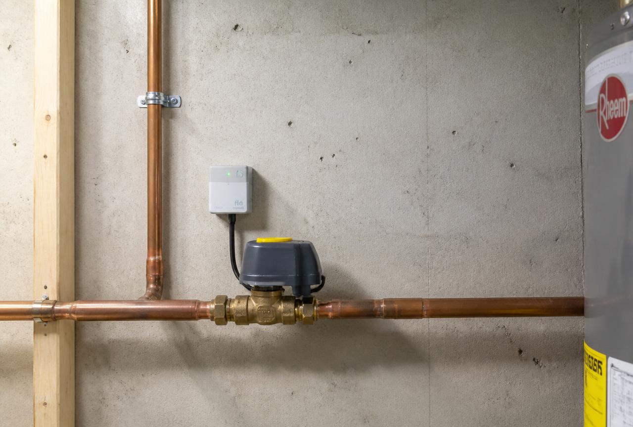 Automatic shutoff valve installed on the main water line in a mechanical room